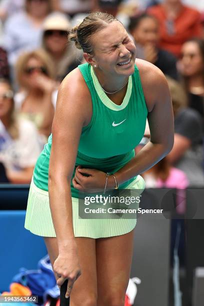 Amanda Anisimova of the United States reacts in their round three singles match against Paula Badosa of Spain during the 2024 Australian Open at...