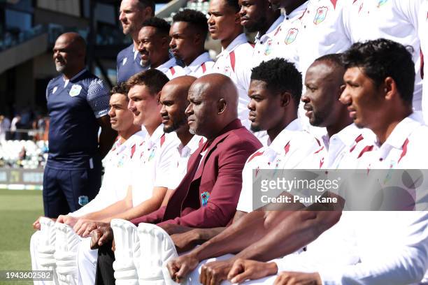 West Indies team manager Rawl Lewis is seen as the West Indies players pose for a team photo before day three of the Mens Test match series between...