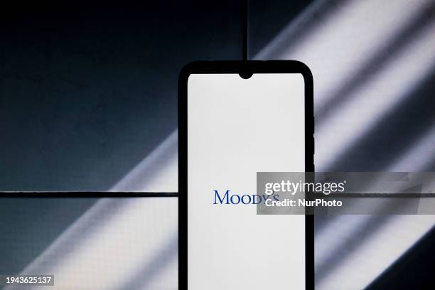 The Moody's logo is being displayed on a smartphone screen in Athens, Greece, on January 22, 2024.