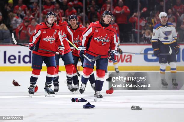 Oshie of the Washington Capitals celebrates after scoring a hat-trick against the St. Louis Blues during the third period at Capital One Arena on...