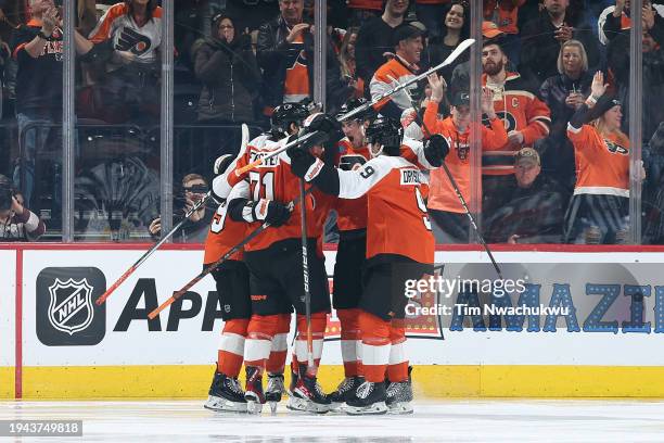 The Philadelphia Flyers react following a goal by Cam Atkinson of the Philadelphia Flyers during the third period at the Wells Fargo Center on...