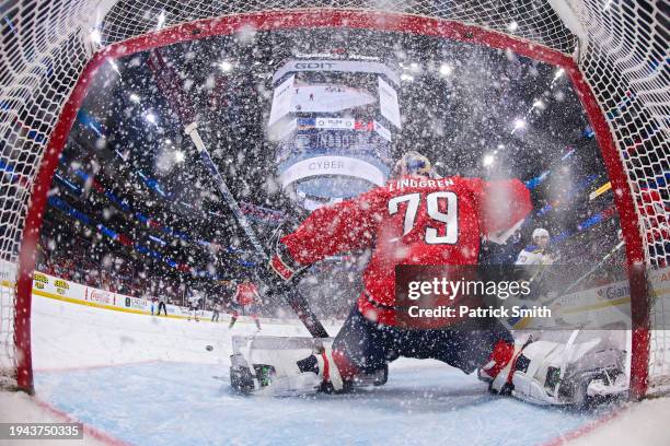 Goalie Charlie Lindgren of the Washington Capitals makes a save against the St. Louis Blues during the first period at Capital One Arena on January...