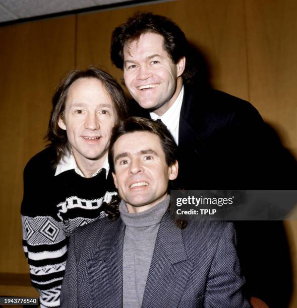 American musicians Peter Tork , Micky Dolenz and English musician Davy Jones , of the American pop group The Monkees, pose for a group portrait in...