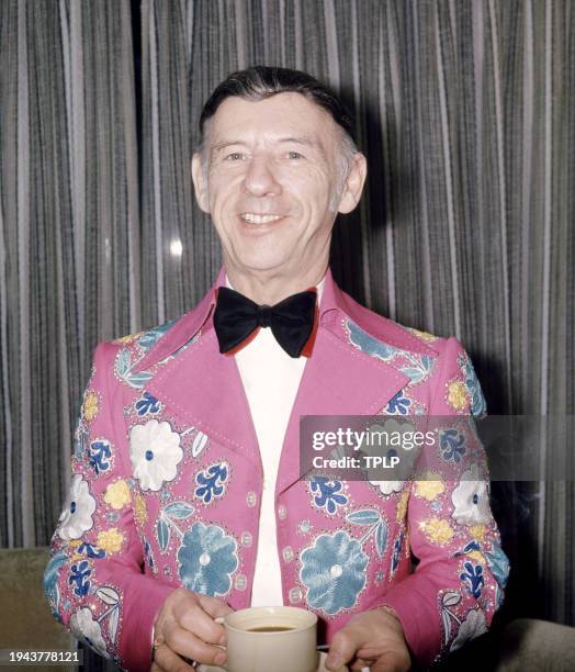 Canadian American country music guitarist Hank Snow poses for a portrait in London, England, November 7, 1973.