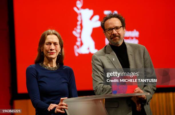 Berlinale Artistic Director Carlo Chatrian and Executive Director Mariette Rissenbeek pose as they hold a press conference on January 22, 2024 in...
