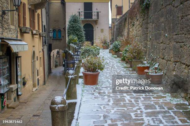 snowy streets of san marino - patrick fort stock pictures, royalty-free photos & images