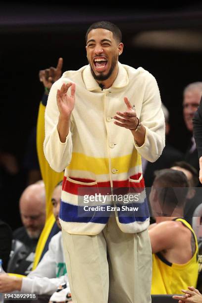 Injured Tyrese Haliburton of the Indiana Pacers reacts on the bench during their game against the Sacramento Kings at Golden 1 Center on January 18,...