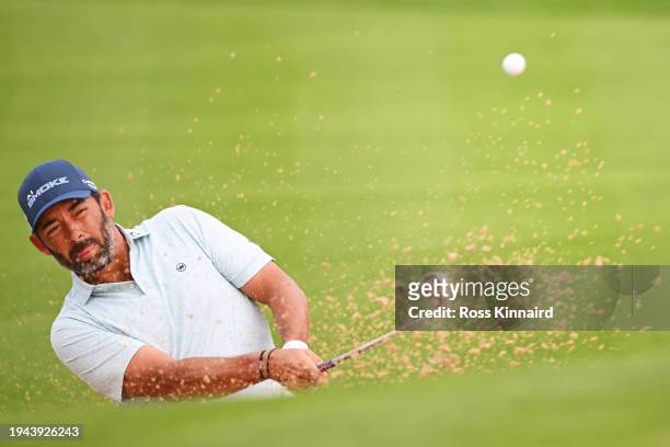 Pablo Larrazabal of Spain plays a bunker shot on the 10th hole during Round Two of the Hero Dubai Desert Classic at Emirates Golf Club on January 19,...