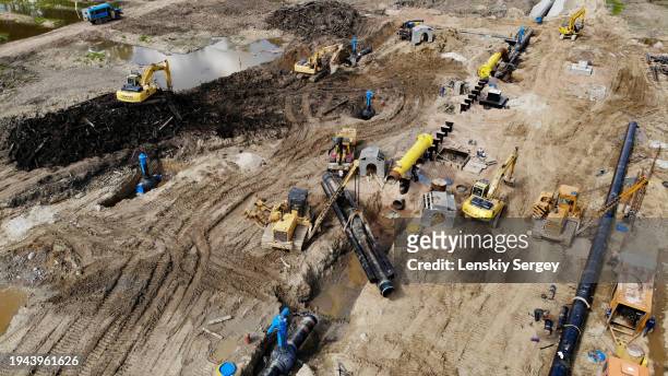 construction of a process pipeline site - kazakhstan stock pictures, royalty-free photos & images