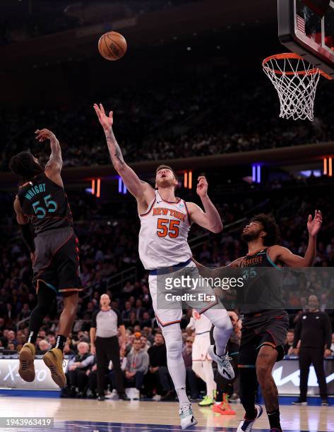 Delon Wright of the Washington Wizards takes a shot as Isaiah Hartenstein of the New York Knicks defends in the third quarter at Madison Square...