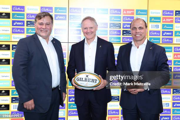 New Wallabies Head Coach Joe Schmidt poses with RA CEO Phil Waugh and RA Director of High-Performance Peter Horne during a Rugby Australia media...