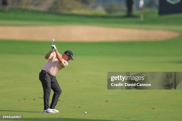 Richie Ramsay of Scotland plays his second shot on the first hole during the second round of the Hero Dubai Desert Classic on The Majlis Course at...