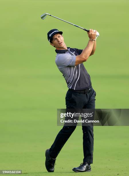 Thorbjorn Olesen of Denmark plays his second shot on the 14th hole during the second round of the Hero Dubai Desert Classic on The Majlis Course at...