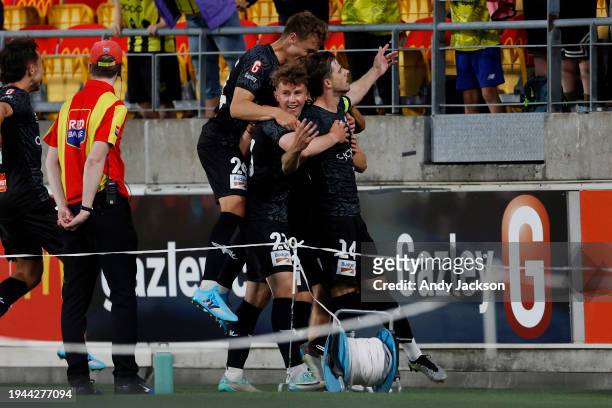 Phoenix players celebrate a goal by Alex Rufer of the Phoenix during the A-League Men round 13 match between Wellington Phoenix and Melbourne Victory...