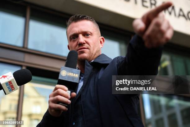Founder and former leader of the anti-Islam English Defence League , Stephen Yaxley-Lennon, also known as Tommy Robinson, gestures as he speaks to...