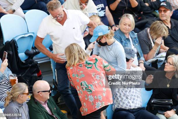 Woman is throwing ''Free Palestine'' leaflets at Margaret Court Arena during a match between Alexander Zverev of Germany and Cameron Norrie of...