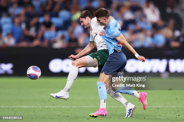 Carl Jenkinson of the Jets competes for the ball against Nathan Amanatidis of Sydney FC during the A-League Men round 13 match between Sydney FC and...