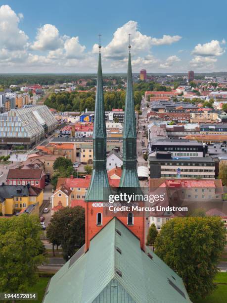 the city of växjö with the cathedral in the foreground - vaxjo imagens e fotografias de stock