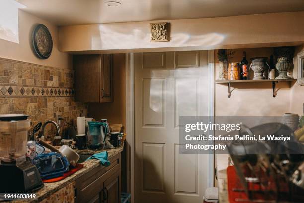 beautiful small kitchen in a basement - basement cellar stock pictures, royalty-free photos & images