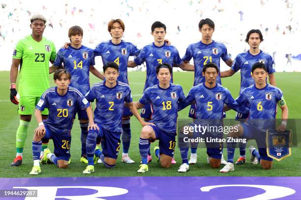 Players of Japan pose for a team photograph prior to the AFC Asian Cup Group D match between Iraq and Japan at Education City Stadium on January 19,...