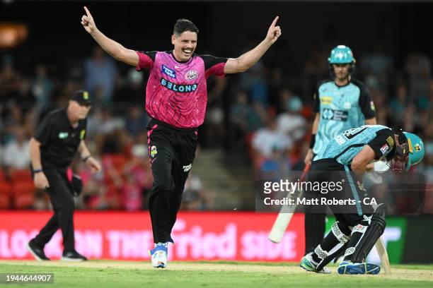 Ben Dwarshuis of the Sixers celebrates the wicket of Michael Neser of the Heat during the Qualifier BBL Finals match between Brisbane Heat and Sydney...