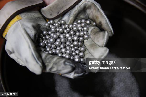 a handful of nickel balls - sudbury stock pictures, royalty-free photos & images