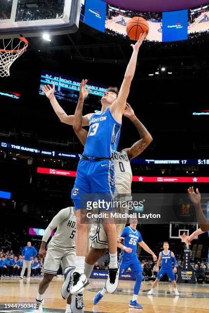 Mason Miller of the Creighton Bluejays drives to the basket during a college basketball game against the Georgetown Hoyas at the Capital One Arena on...