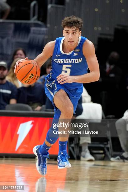 Francisco Farabello of the Creighton Bluejays dribbles up court during a college basketball game against the Georgetown Hoyas at the Capital One...