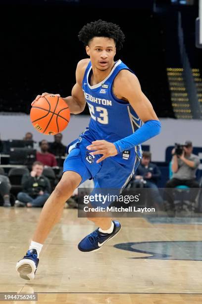 Trey Alexander of the Creighton Bluejays dribbles the ball during a college basketball game against the Georgetown Hoyas at the Capital One Arena on...