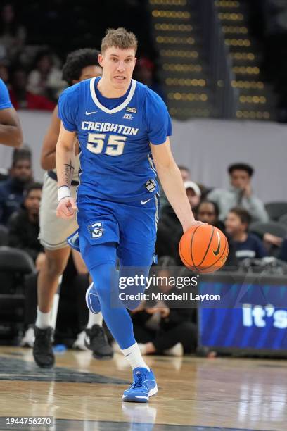 Baylor Scheierman of the Creighton Bluejays dribbles up court during a college basketball game against the Georgetown Hoyas at the Capital One Arena...