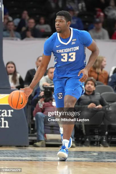 Fredrick King of the Creighton Bluejays dribbles up court during a college basketball game against the Georgetown Hoyas at the Capital One Arena on...