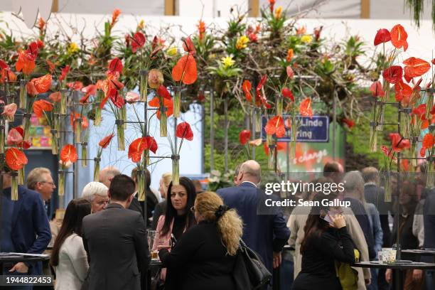 Visitors gather in the Holland hall at the Green Week agricultural trade fair on its opening day on January 19, 2024 in Berlin, Germany. The fair...