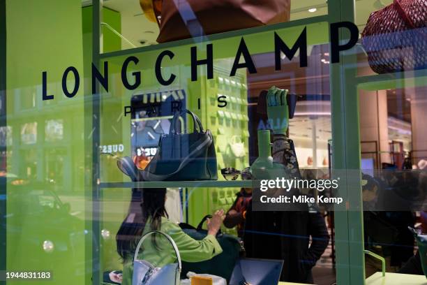 Longchamp shop window in Knightsbridge on 19th January 2024 in London, United Kingdom. Knightsbridge is one of the principal areas for upmarket...
