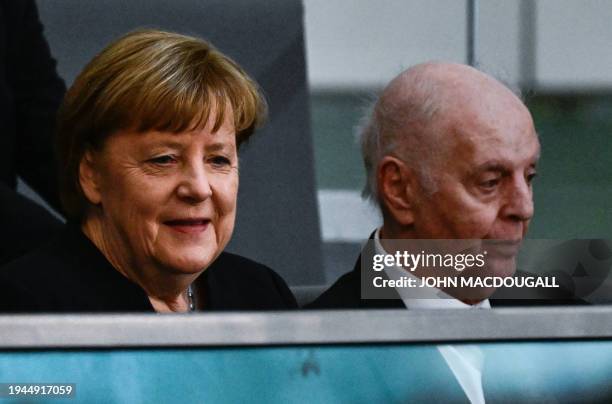 Former German Chancellor Angela Merkel and Argentine-born classical pianist and conductor Daniel Barenboim attend a memorial event to honour the late...