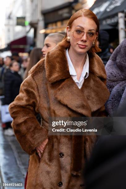 Guest wears a brown fur coat, outside 032c, during the Menswear Fall/Winter 2024/2025 as part of Paris Fashion Week on January 18, 2024 in Paris,...