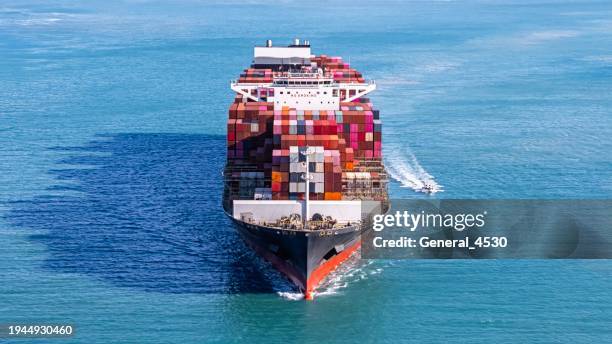 aerial view of a large loaded container ship. - bulk carrier stock pictures, royalty-free photos & images