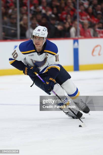 Brayden Schenn of the St. Louis Blues skates against the Washington Capitals during the third period at Capital One Arena on January 18, 2024 in...