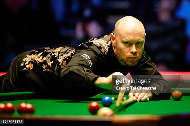 Gary Wilson of England plays a shot in the quarterfinal match against Ronnie O'Sullivan of England on day 5 of the 2024 Spreadex World Grand Prix at...