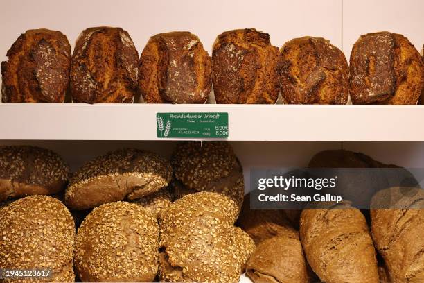 Whole grain loaves of bread lie on display at the Green Week agricultural trade fair on its opening day on January 19, 2024 in Berlin, Germany. The...