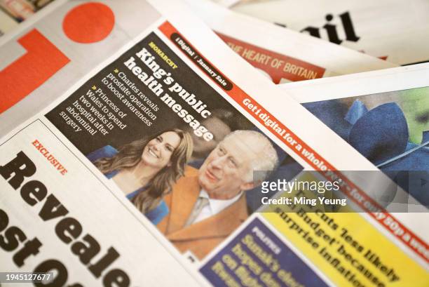 In this photo illustration, A selection of front pages from UK daily national newspaper coverage of of King Charles and Catherine, The Princess of...
