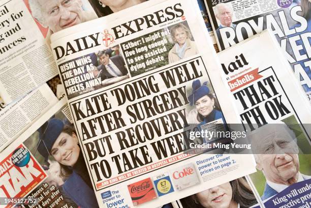 In this photo illustration, A selection of front pages from UK daily national newspaper coverage of of King Charles and Catherine, The Princess of...