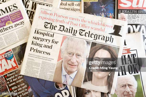 In this photo illustration, A selection of front pages from UK daily national newspaper coverage of of King Charles and Catherine, The Princess of...