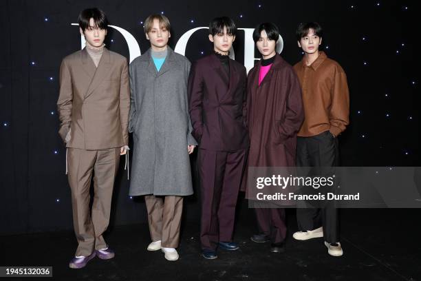 Soobin, HueningKai, Yeonjun, Beomgyu, Taehyun of South Korean boy band TOMORROW X TOGETHER attends the Dior Homme Menswear Fall/Winter 2024-2025 show...