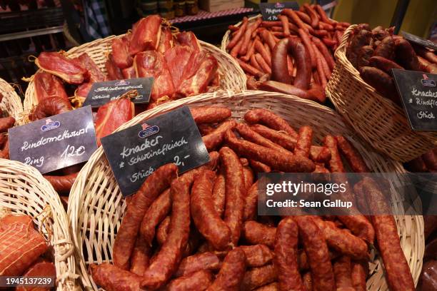 Cured beef and pork sausages lie on display at the Green Week agricultural trade fair on its opening day on January 19, 2024 in Berlin, Germany. The...