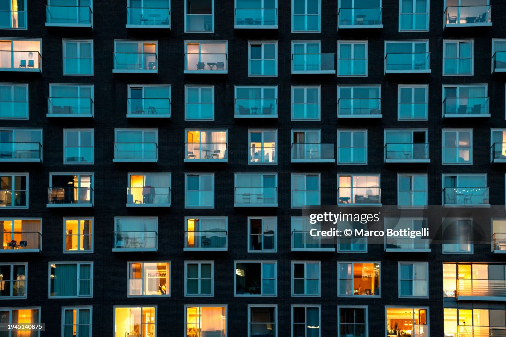 Modern building facade at night, London, UK