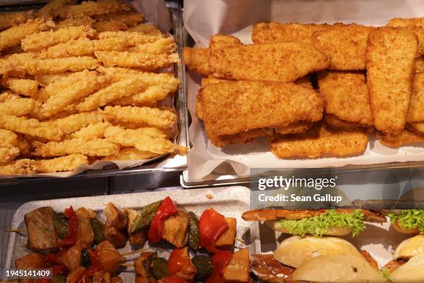 Fried and smoked fish lie on display for sale at the Green Week agricultural trade fair on its opening day on January 19, 2024 in Berlin, Germany....