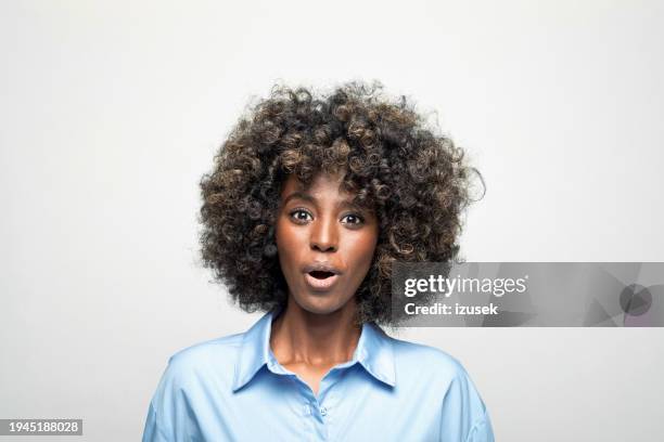 portrait of a surprised young businesswoman - disbelief stock pictures, royalty-free photos & images