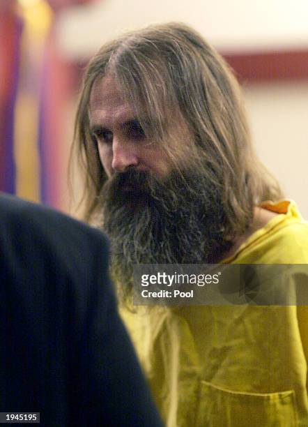Brian David Mitchell, dressed in prison clothing, returns to jail after a court hearing April 22, 2003 in Salt Lake City, Utah. Mitchell is charged...
