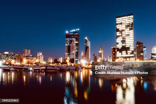 kuwait city sunset - kuwait towers stock pictures, royalty-free photos & images