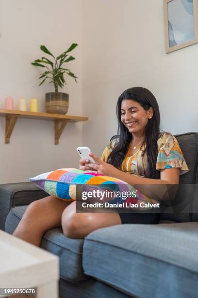 woman texting at home - casa calvet stock pictures, royalty-free photos & images